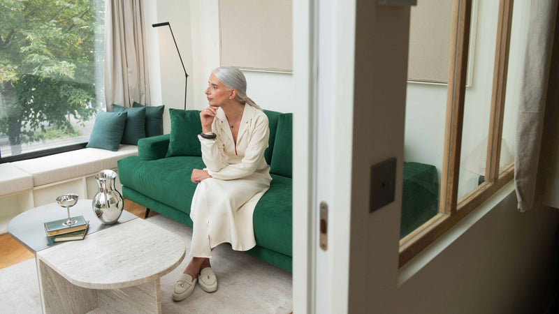 IKKHO dresses collection hero image featuring modern midi dresses with fluid movement, thoughtful coverage, and quiet presence