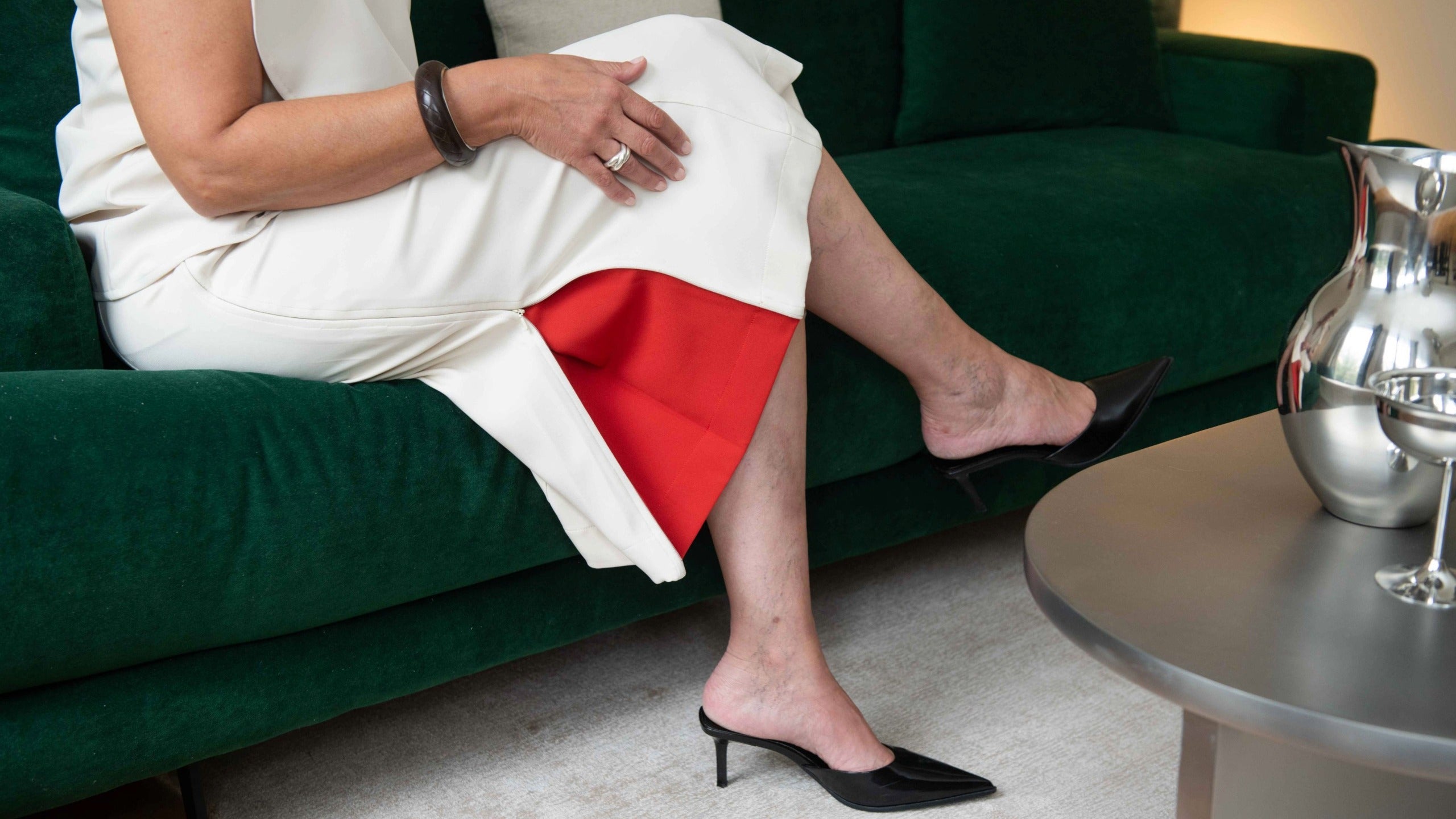 IKKHO skirts collection hero image featuring modern midi skirts designed for adjustable shape, movement, and confident dressing