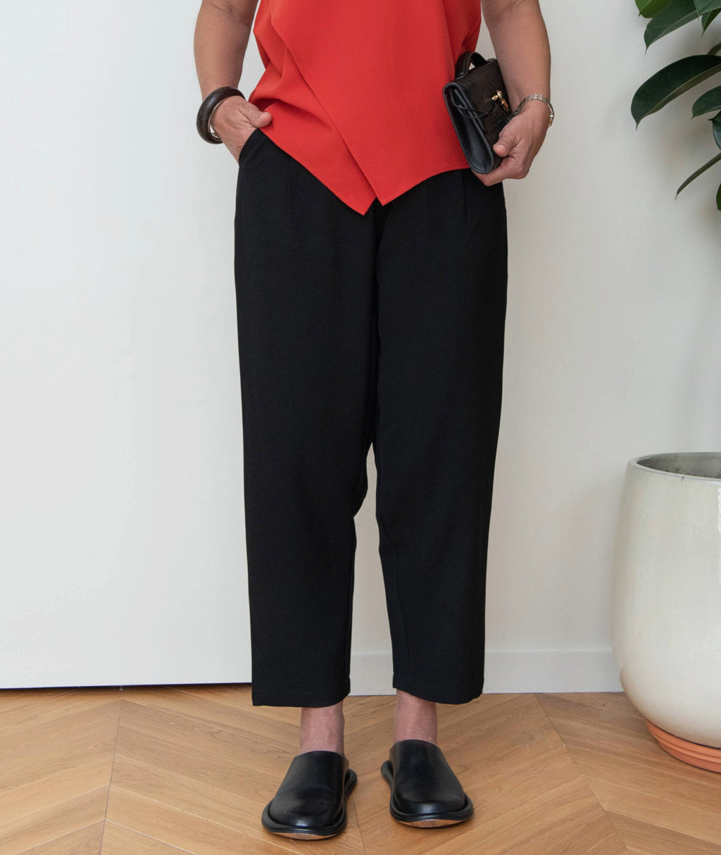Front view of Balance Peg Trousers by IKKHO showing relaxed fit tapered leg and ankle length