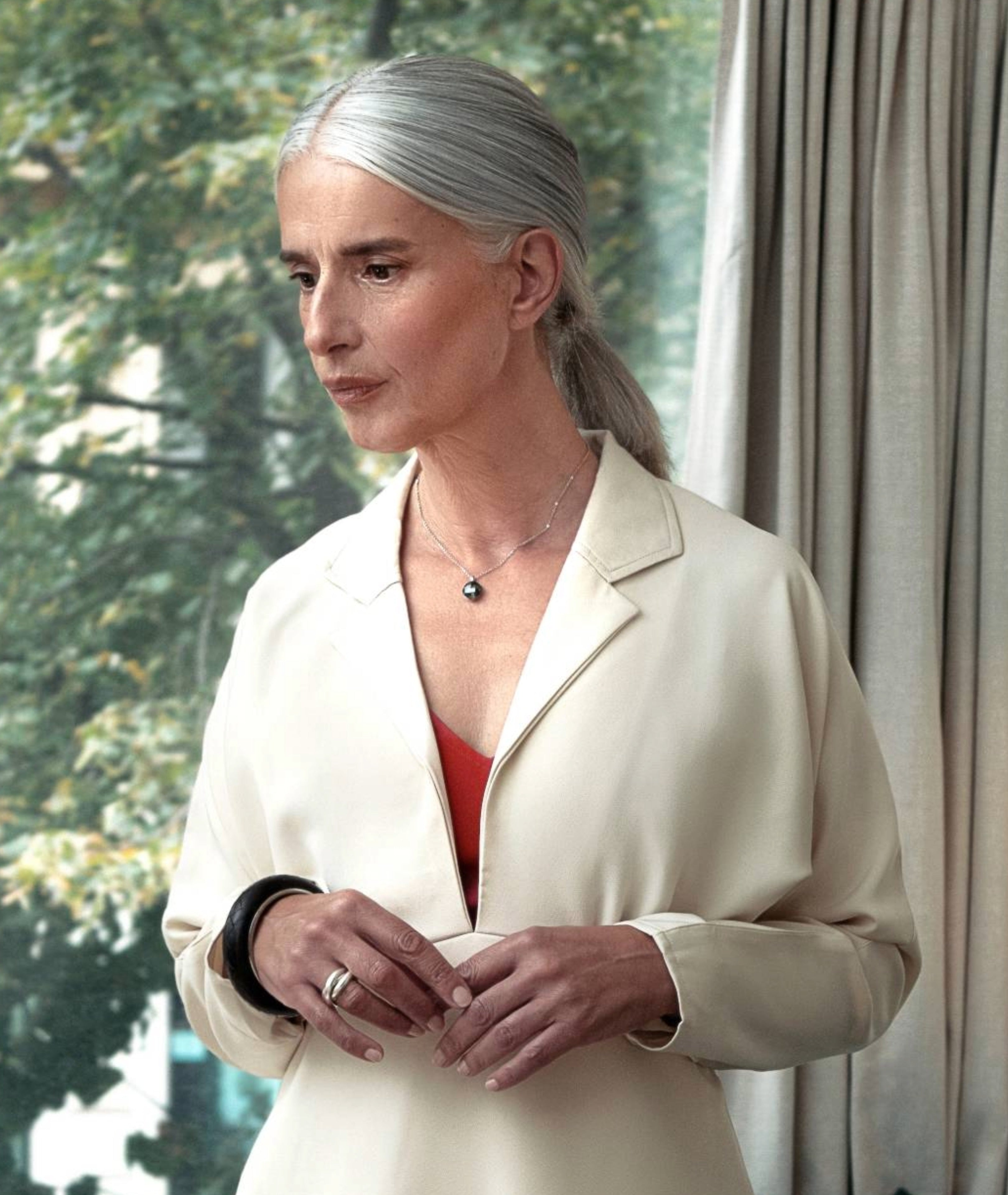 Detail view of Drift Midi Dress ivory showing collared deep V neckline with optional contrast orange bustier