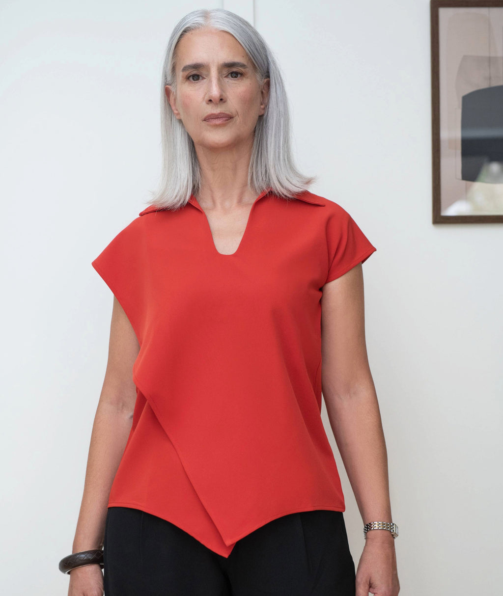 Detail of deep V neckline and structured power collar on the Wave Overlap tunic dress by IKKHO
